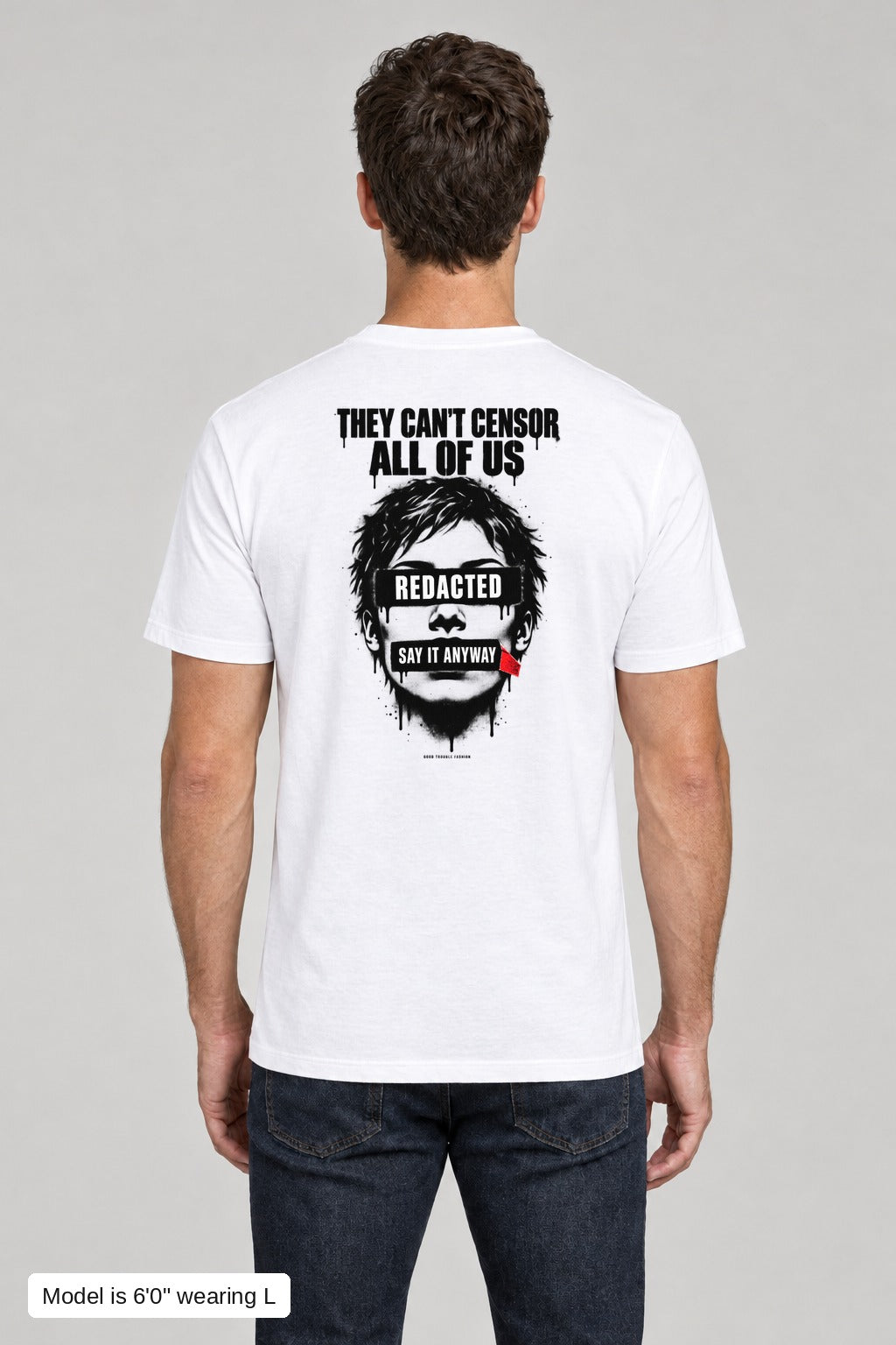 They Can't Censor All of Us Tee in White, back, black-ink censored face print, on an athletic model wearing size L, 6'0" - Good Trouble Fashion