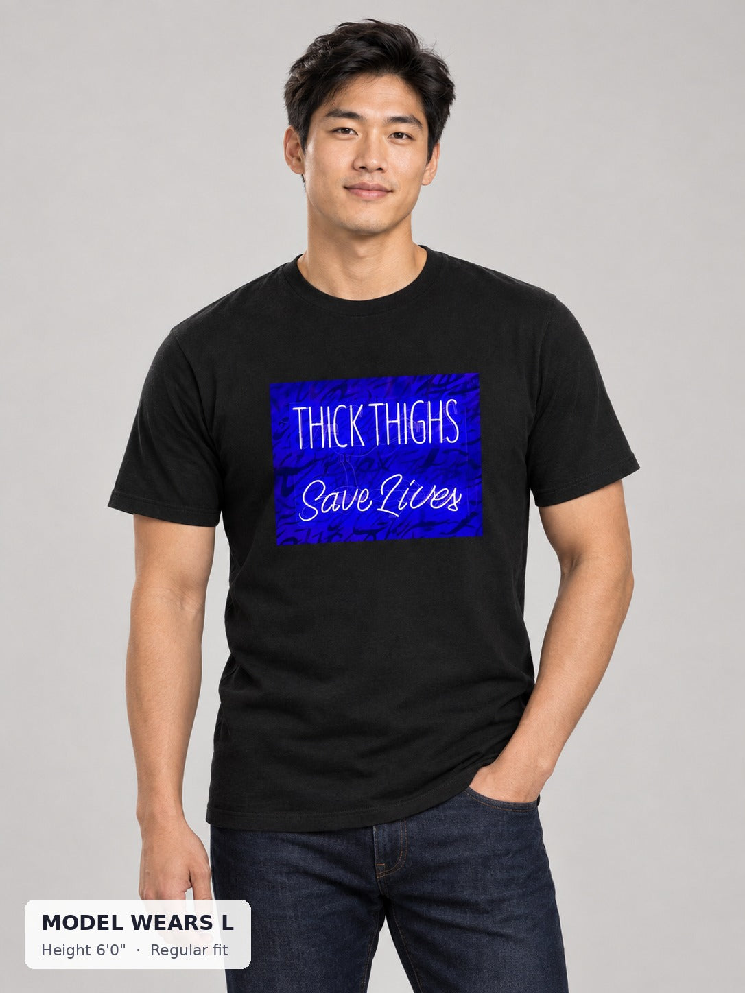 Thick Thighs Save Lives Tee on an athletic model wearing size L, 6'0" - Good Trouble Fashion