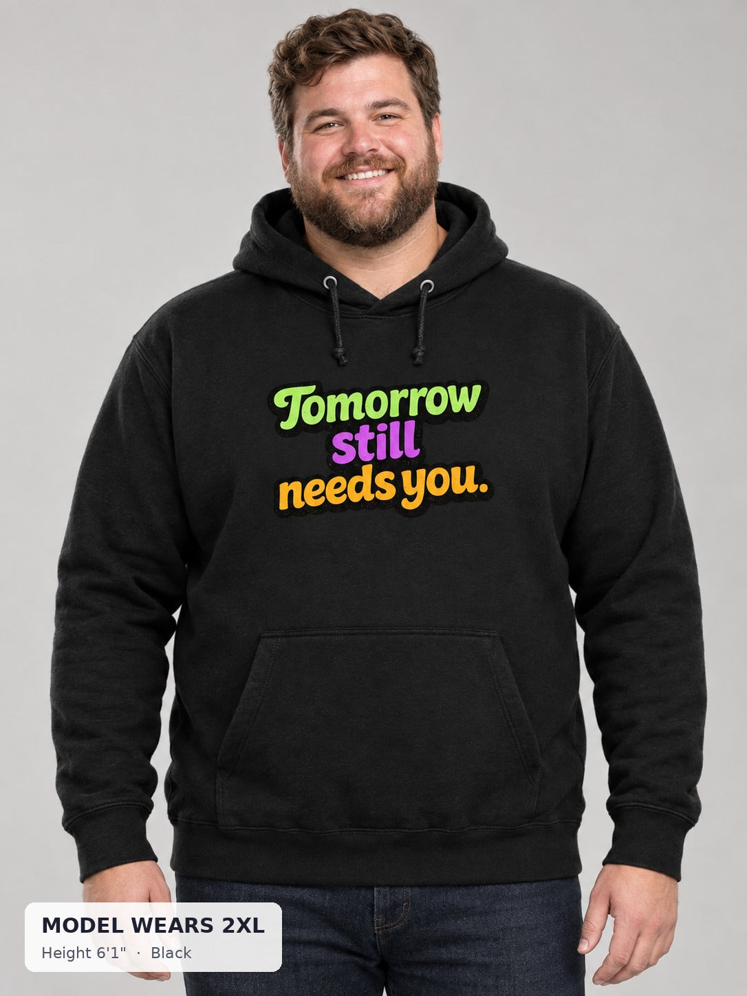 Tomorrow Still Needs You Hoodie in Black on a plus-size model wearing size 2XL, 6'1" - Good Trouble Fashion