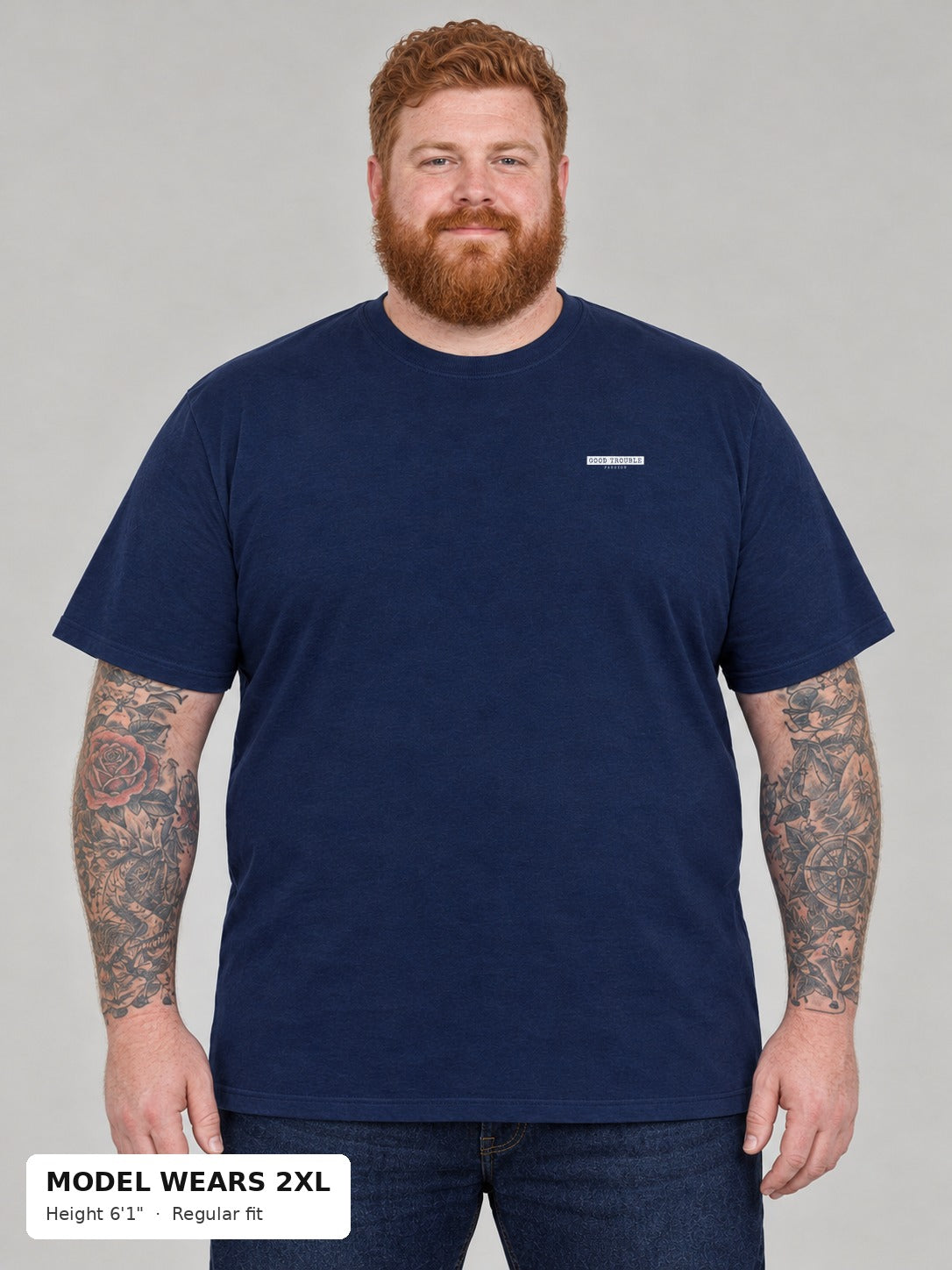 Unapologetic Pride Tee in Navy, front, Good Trouble Fashion left-chest label, on a plus-size model wearing size 2XL, 6'1" - Good Trouble Fashion