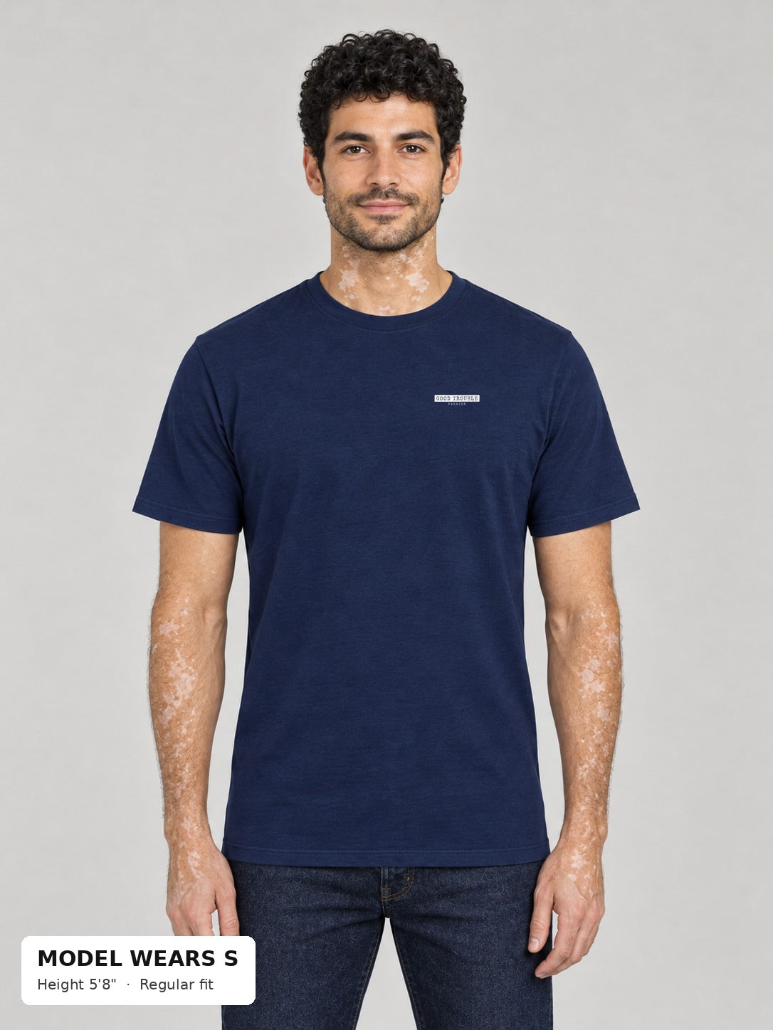 Unapologetic Pride Tee in Navy, front, Good Trouble Fashion left-chest label, on a slim model wearing size S, 5'8" - Good Trouble Fashion