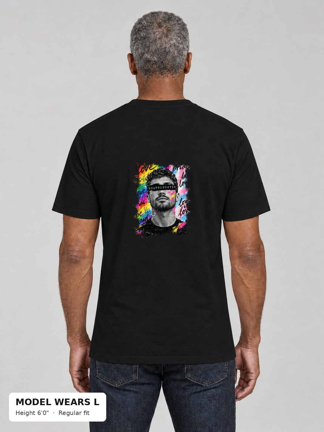 Unapologetic Pride Tee in Black, back, Unapologetic bearded man portrait print, on an athletic model wearing size L, 6'0" - Good Trouble Fashion