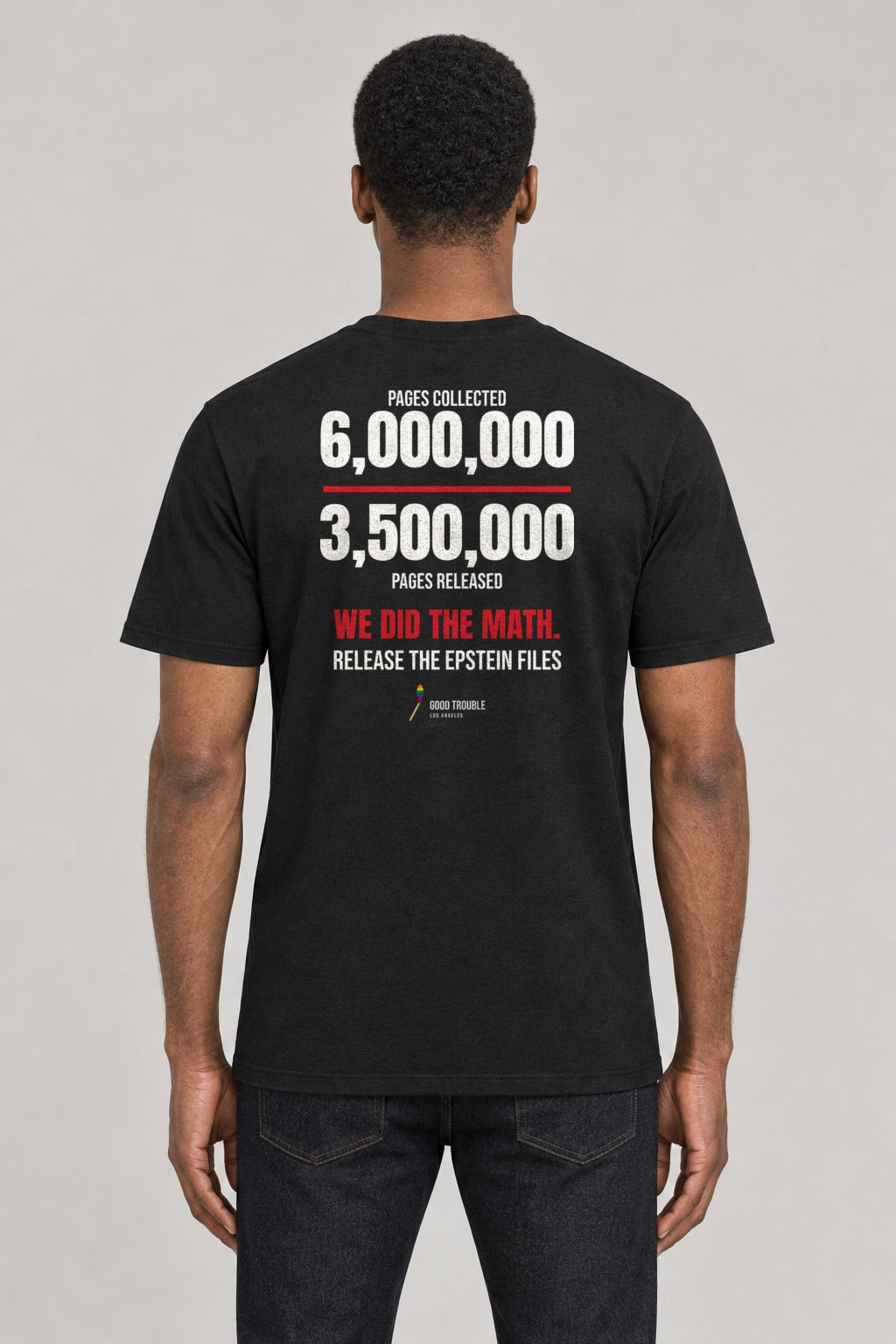 We Did the Math Epstein Files Tee in Black, back view showing the 6,000,000 over 3,500,000 back print, on an athletic model wearing size L, 6'0" - Good Trouble Fashion