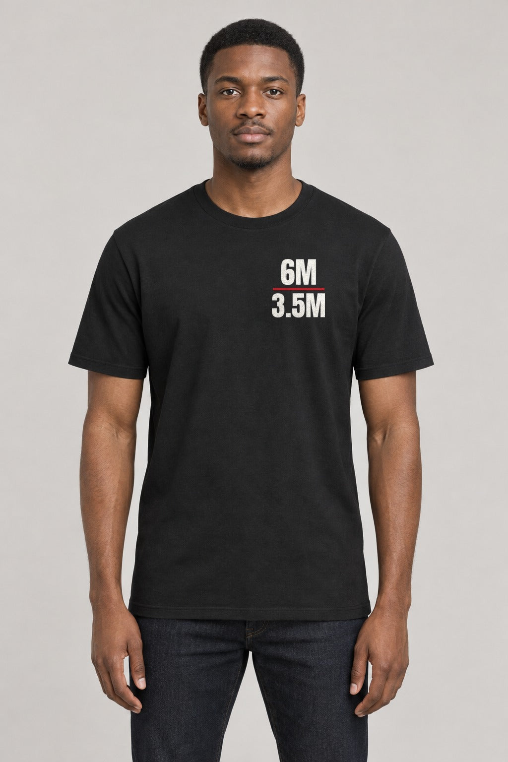 We Did the Math Epstein Files Tee in Black, front view showing the 6M over 3.5M left-chest badge, on an athletic model wearing size L, 6'0" - Good Trouble Fashion