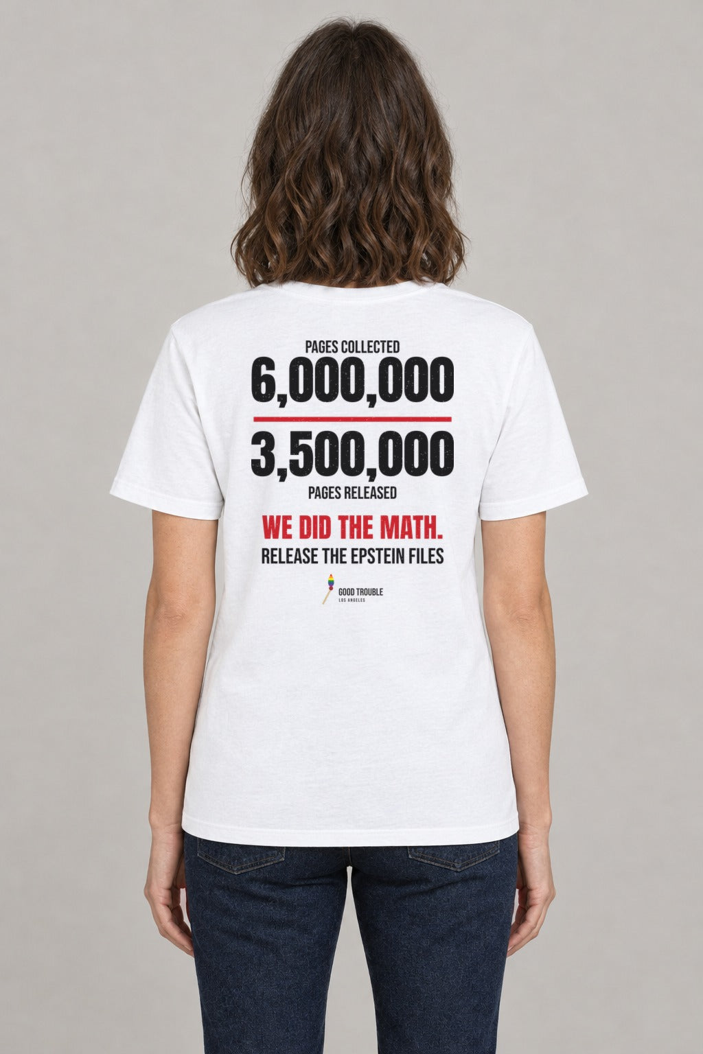 We Did the Math Epstein Files Tee in White, back view showing the 6,000,000 over 3,500,000 back print, on a slim model wearing size S, 5'8" - Good Trouble Fashion