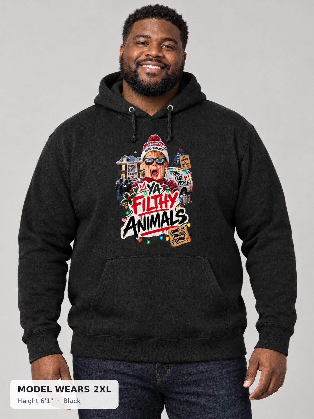 Ya Filthy Animals Holiday Hoodie in Black on a plus-size model wearing size 2XL, 6'1" - Good Trouble Fashion